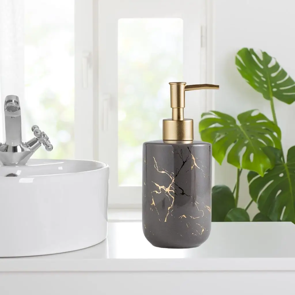 distributeur savon liquide en marbre gris doré
